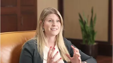 blonde woman gesticulating