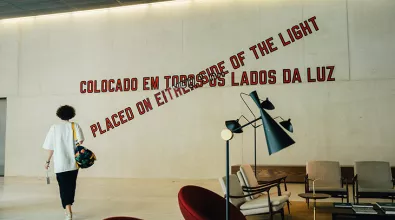Employee walking in the entrance area of edp's headquarters in lisbon