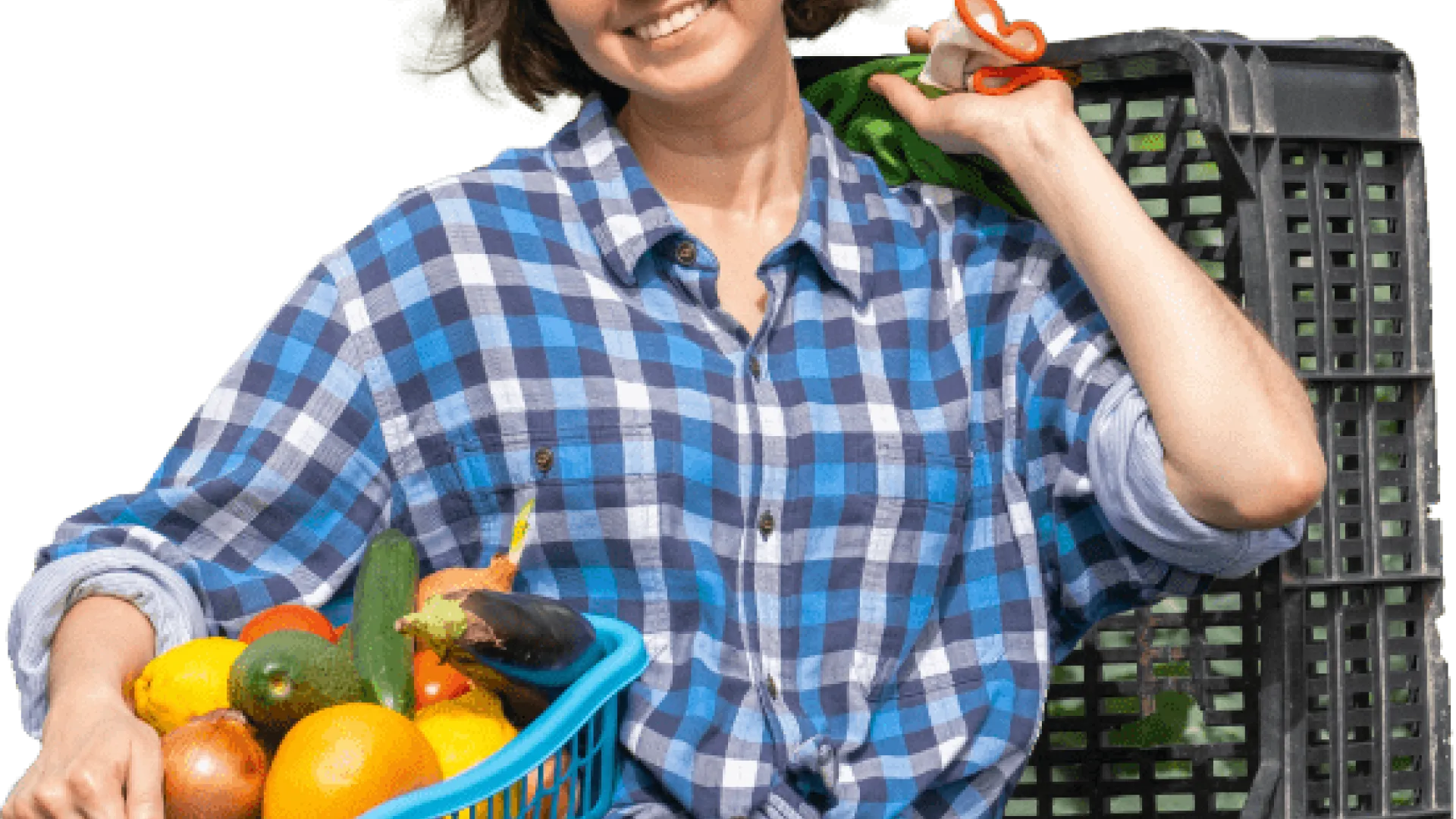 Woman holding a blue basket with fruit in the front, and a black basket on her back