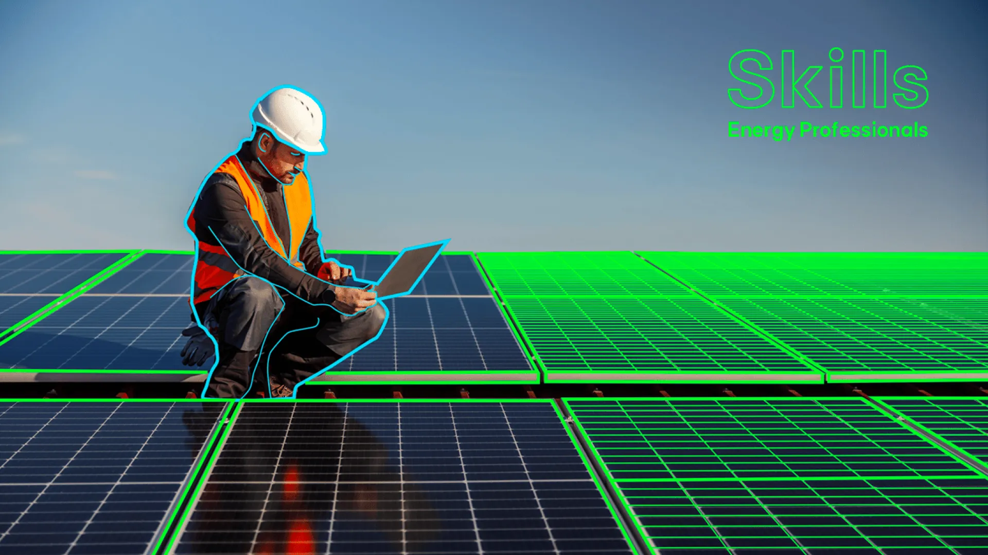Technician seated with a laptop on a roof covered in solar panels