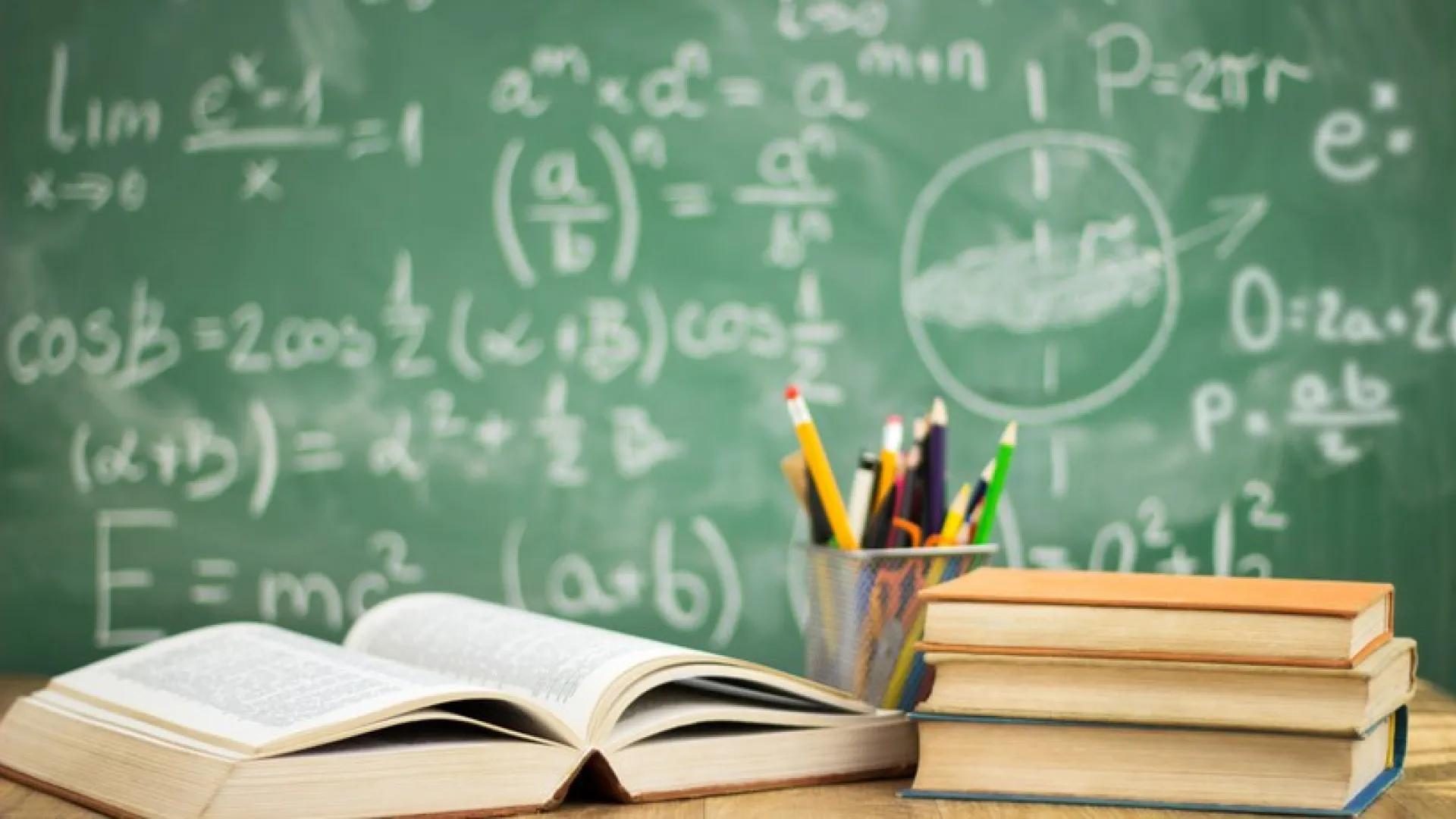 Books, pensils and a eraser board