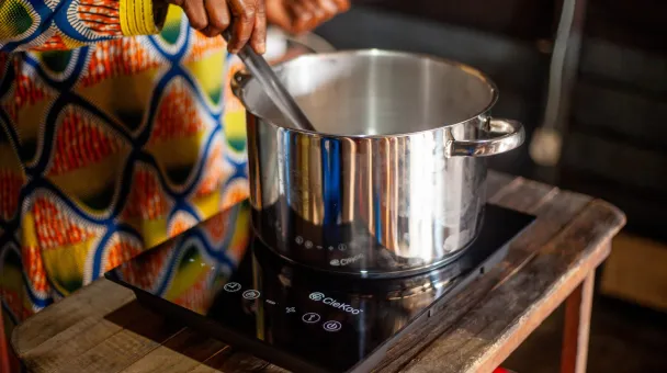 A silver pan on top of an electric stove