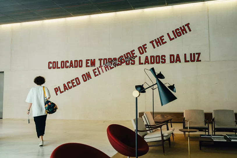 Employee walking in the entrance area of edp's headquarters in lisbon