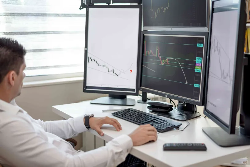 man looking at computer screen