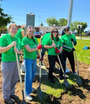 EDPR NA Team members volunteering and shoveling 